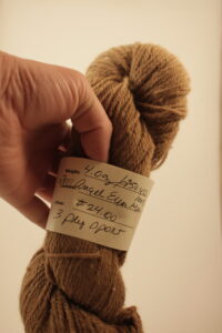 Light brown alpaca yarn skein from the alpaca Angel Eyes from Foster's Trail and Alpaca Farm