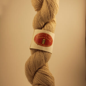 Light maize colored alpaca yarn skein blended from the alpacas Cherokee, Aphrodite and Chucky. From the Foster's Trail and Alpaca Farm from Cleveland, Tennessee.